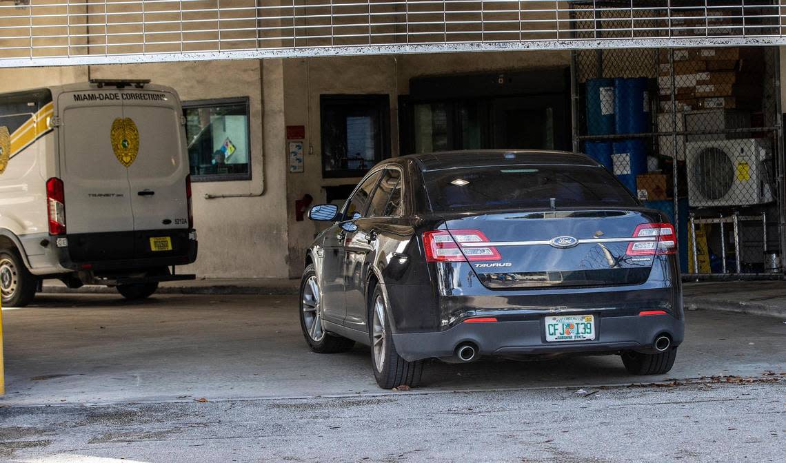 A police car carrying Miami-Dade Commissioner Joe Martinez arrives at the Miami-Dade Turner Guilford Knight Correctional Center in Doral on Tuesday morning, Aug. 30, 2022, as he surrendered to face criminal charges. He is accused of accepting $15,000 in exchange for sponsoring a proposed law five years ago to help a business owner seeking looser county rules.