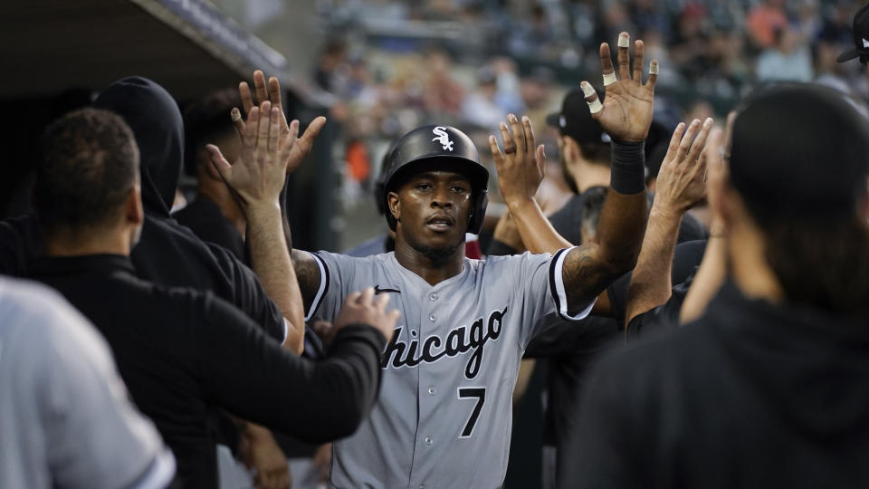 Chicago White Sox's Tim Anderson (7) celebrates scoring against the Detroit Tigers in the third inning of a baseball game in Detroit, Monday, Sept. 20, 2021. (AP Photo/Paul Sancya)