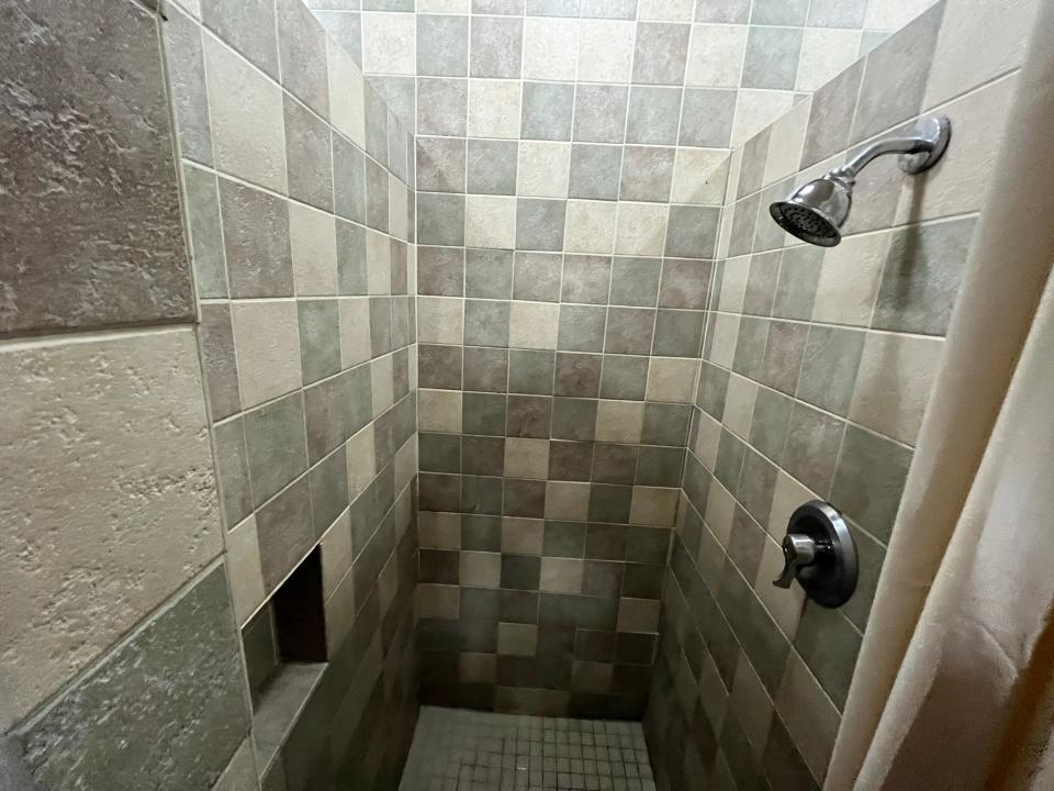 disney comfort station shower with tile