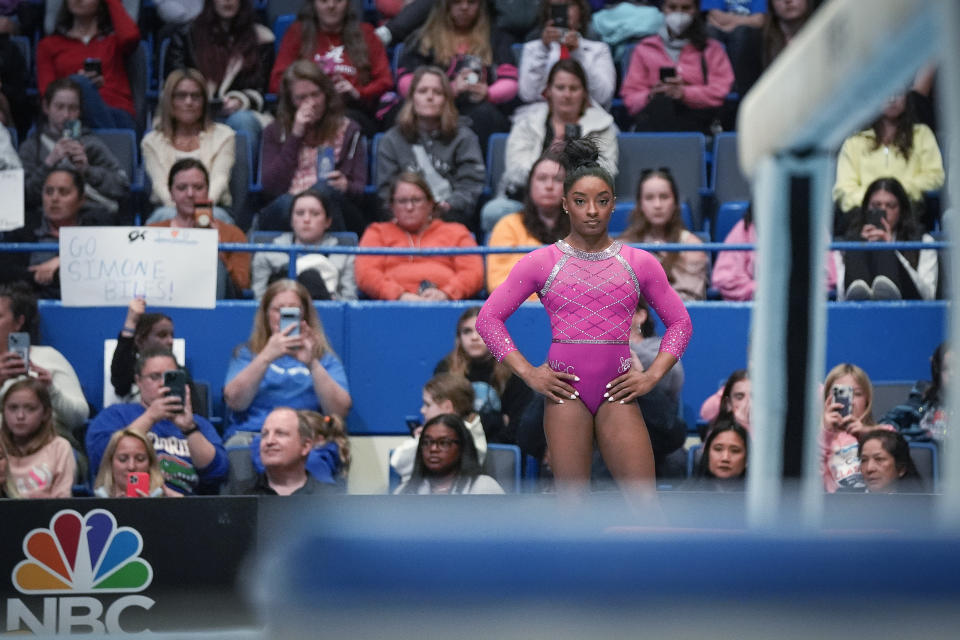 Simone Biles prepares to compete on the balance beam during the U.S. Classic gymnastics event Saturday, May 18, 2024, in Hartford, Conn. (AP Photo/Bryan Woolston)