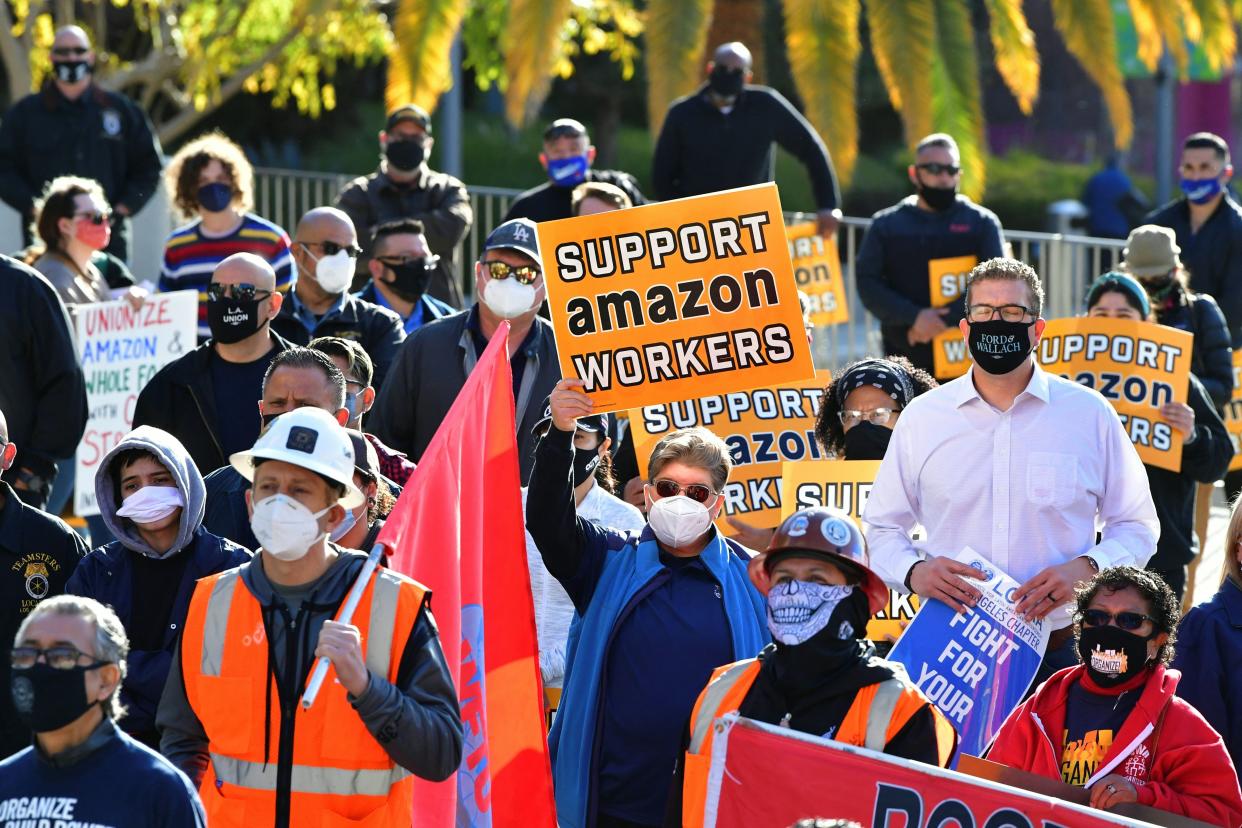 Union leaders are joined by community group representatives, elected officials and social activists for a rally in support of unionization efforts by Amazon workers in the state of Alabama on March 21, 2021 in Los Angeles, California. - Workers and organizers are pushing for what would be one of the biggest victories for labor in the United States over the past few decades if successful in the first Amazon wharehouse union election in Bessemer, Alabama, where worker's ballots must reach the regional office of the National Labor Relations Board by March 29 to be counted.