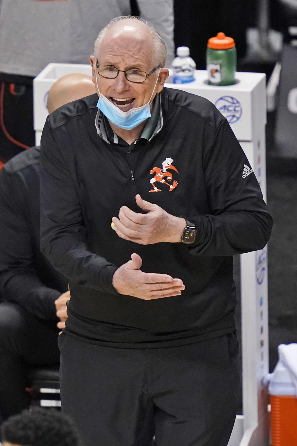 Miami head coach Jim Larranaga directs his team during the second half of an NCAA college basketball game against Clemson in the second round of the Atlantic Coast Conference tournament in Greensboro, N.C., Wednesday, March 10, 2021. (AP Photo/Gerry Broome)