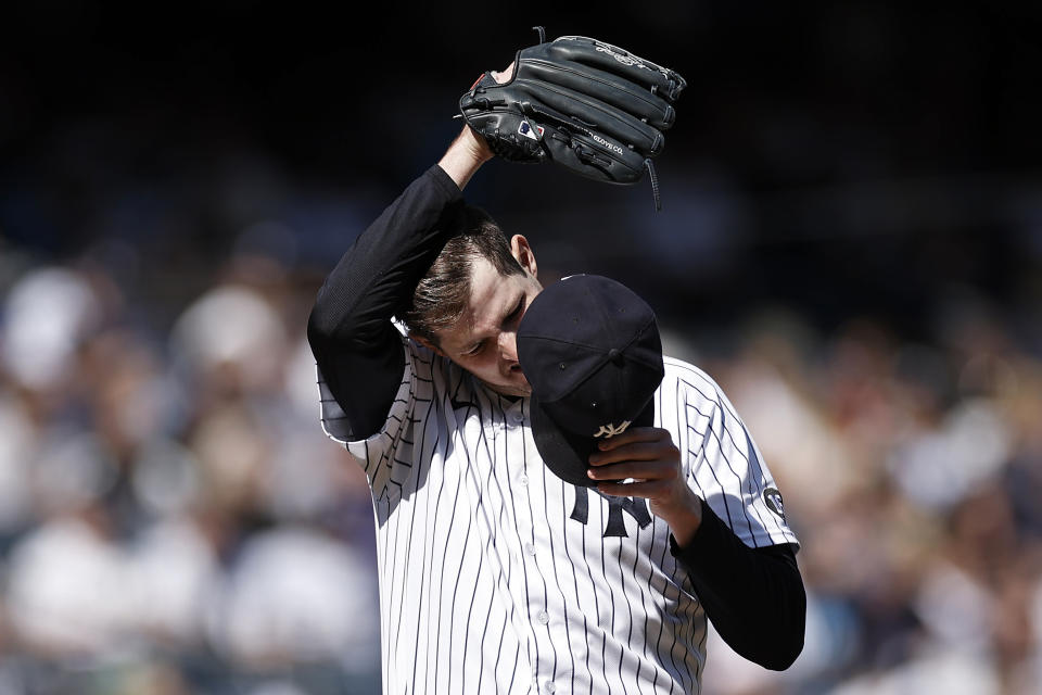 New York Yankees pitcher Jordan Montgomery reacts during the third inning of a baseball game against the Tampa Bay Rays on Saturday, Oct. 2, 2021, in New York. (AP Photo/Adam Hunger)