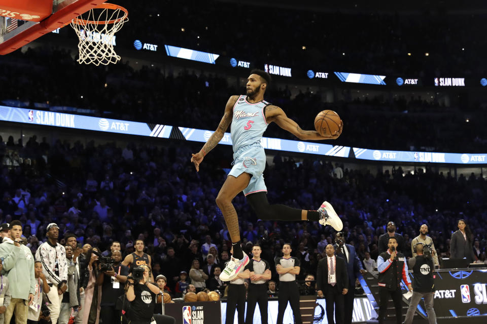 Miami Heat's Derrick Jones Jr. heads to the basket during the NBA All-Star slam dunk contest in Chicago, Saturday, Feb. 15, 2020. (AP Photo/Nam Y. Huh)