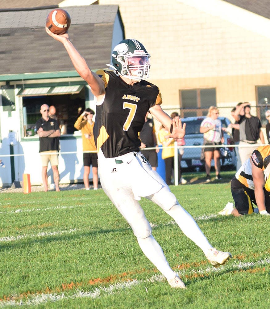 Northridge senior quarterback Lane Hess was playing his first home game last Friday against Watkins Memorial since the death of his dad, Jim Hess, who was a long-time assistant coach and supporter of the school.