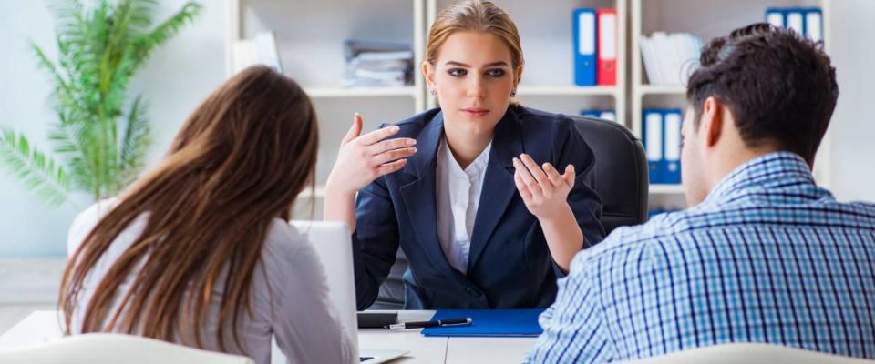 Young family disappointed in bank