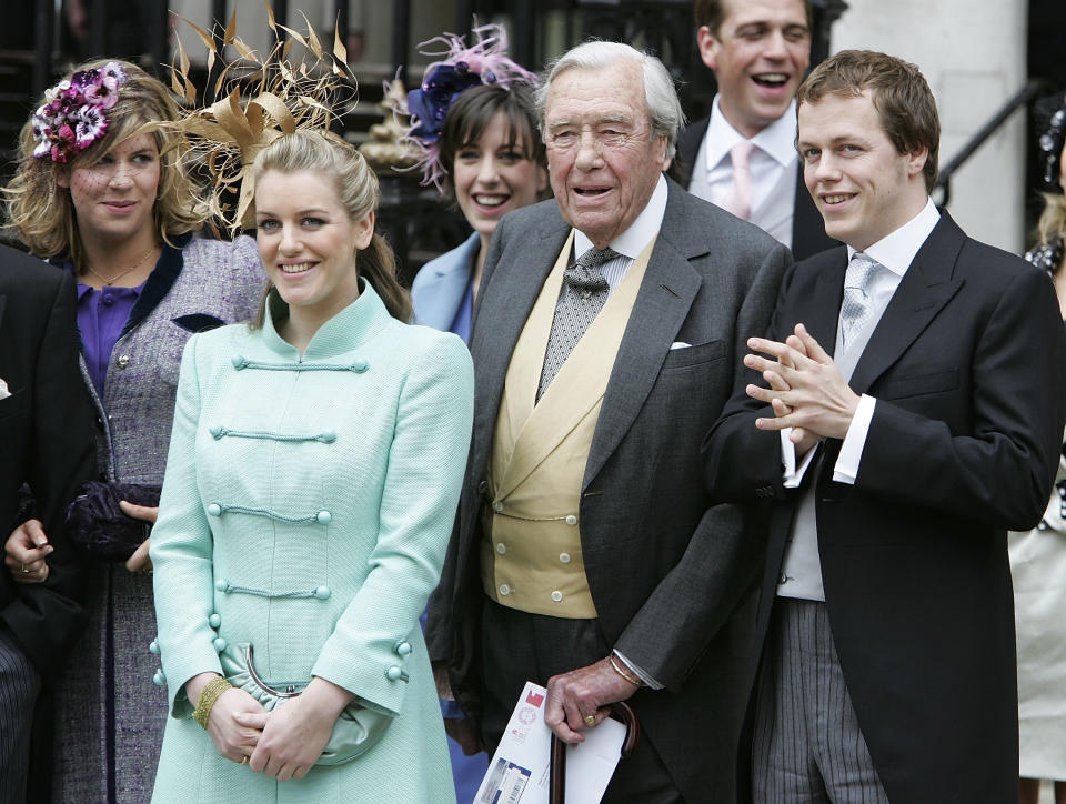 WINDSOR, ENGLAND- APRIL 09:  (L-R) Laura Parker Bowles, Major Bruce Shand and Tom Parker Bowles depart the Civil Ceremony following the marriage between HRH Prince Charles & Mrs Camilla Parker Bowles, at The Guildhall, Windsor on April 9, 2005 in Berkshire, England.  (Photo by Georges De Keerle/Getty Images)