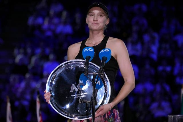 Elena Rybakina holds the runner-up trophy 