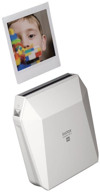 Fujifilm Instax SP-3 mobile printer, <a href="https://www.amazon.com/Fujifilm-Instax-SP-3-Mobile-Printer/dp/B076DRQ5XB/ref=sr_1_3?s=electronics&amp;ie=UTF8&amp;qid=1511998985&amp;sr=1-3&amp;keywords=fujifilm+instax+share+sp-3" target="_blank">$199 at Amazon</a> (Photo: Amazon)