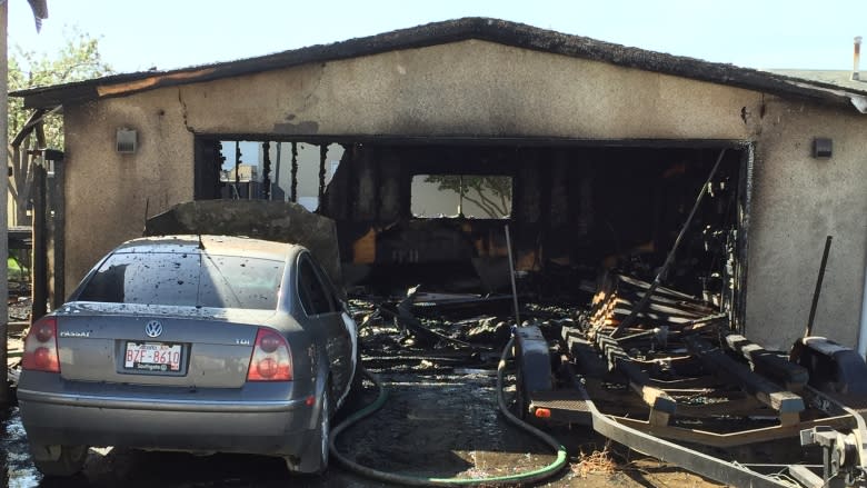 'Heck of a good save' on windy day as Edmonton firefighters keep garage fire from spreading