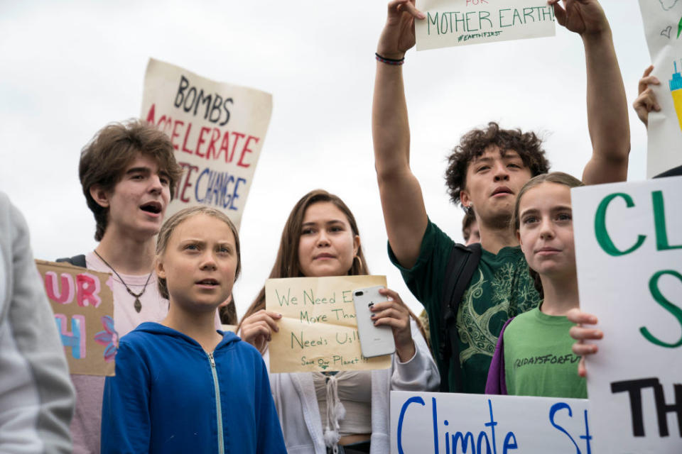 Pictured: Activist Greta Thunberg and students protesting climate inaction. Image: Getty