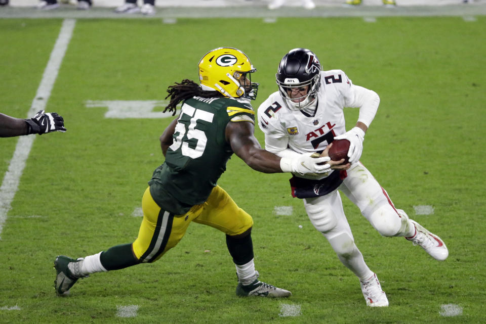 Atlanta Falcons quarterback Matt Ryan (2) is sacked by Green Bay Packers' Za'Darius Smith (55) during the second half of an NFL football game, Monday, Oct. 5, 2020, in Green Bay, Wis. (AP Photo/Mike Roemer)