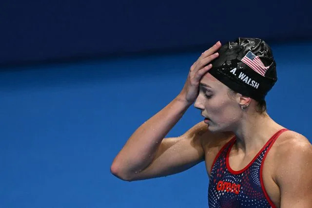 <p>OLI SCARFF/AFP via Getty Images</p> Alex Walsh reacts after competing in the final of the women's 200m individual medley swimming event during the Paris 2024 Olympic Games at the Paris La Defense Arena in Nanterre, west of Paris, on Aug. 3, 2024