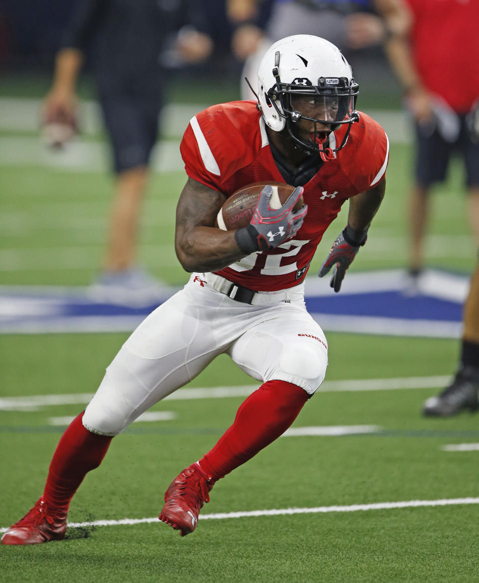 Texas Tech’s Da’Leon Ward (32) carries the ball during the NCAA college football team’s spring game Saturday, April 1, 2017, in Frisco, Texas. (Brad Tollefson/Lubbock Avalanche-Journal via AP)