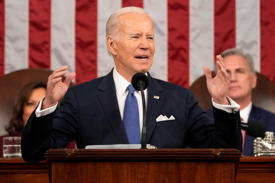 President Joe Biden delivers the State of the Union address to a joint session of Congress at the U.S. Capitol, Tuesday, Feb. 7, 2023, in Washington, as Vice President Kamala Harris and House Speaker Kevin McCarthy of Calif., listen.  Jacquelyn Martin/Pool via REUTERS