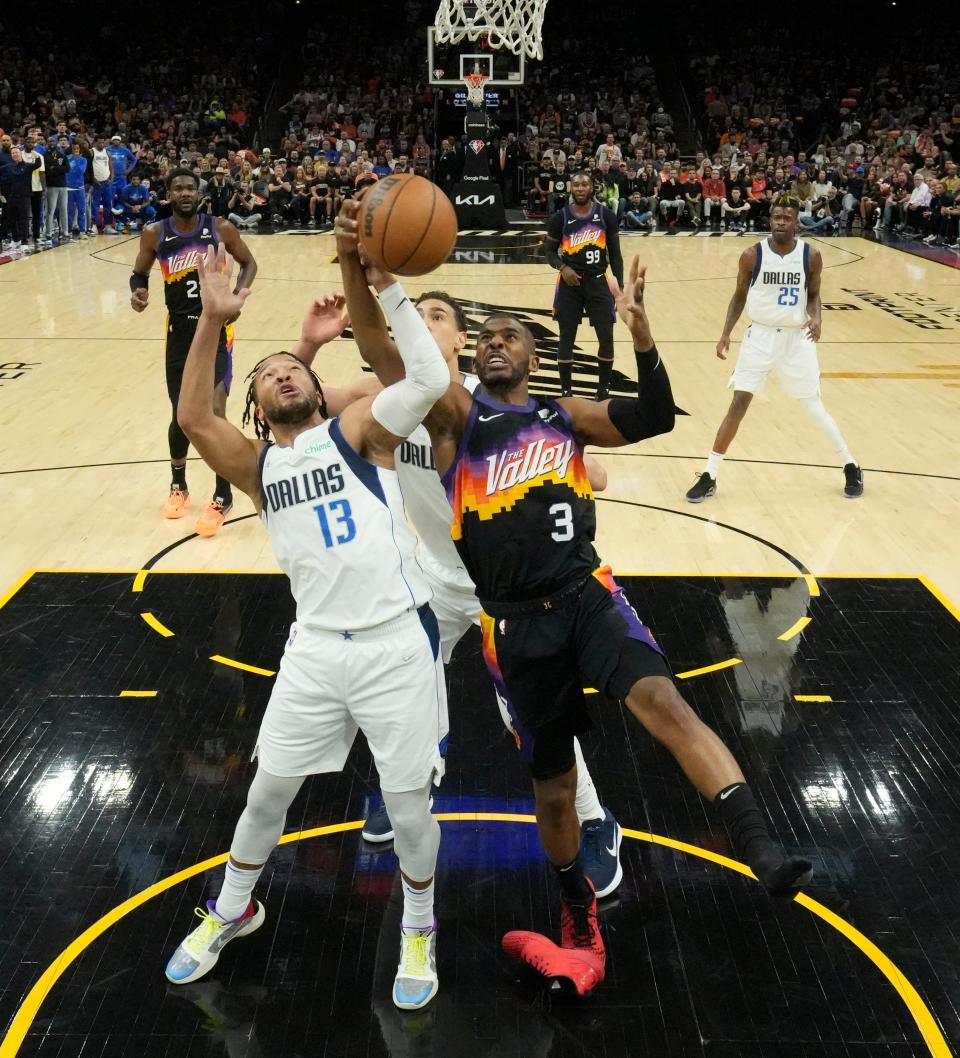 U.S.; Phoenix Suns guard Chris Paul (3) loses his show while fighting for a rebound with Dallas Mavericks guard Jalen Brunson (13) during Game 2 of the Western Conference semifinals at Footprint Center.