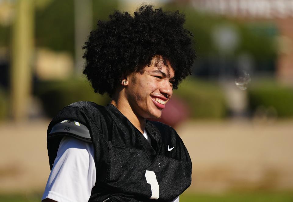 Hamilton wide-out Legend Bernard (1) smiles on the sideline during practice at Hamilton High School in Chandler on Oct. 18, 2022.