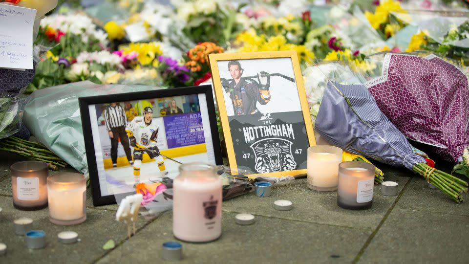 Tributes to Johnson are laid outside the Motorpoint Arena in Nottingham, England. - Ben Booth/SOPA Images/Shutterstock