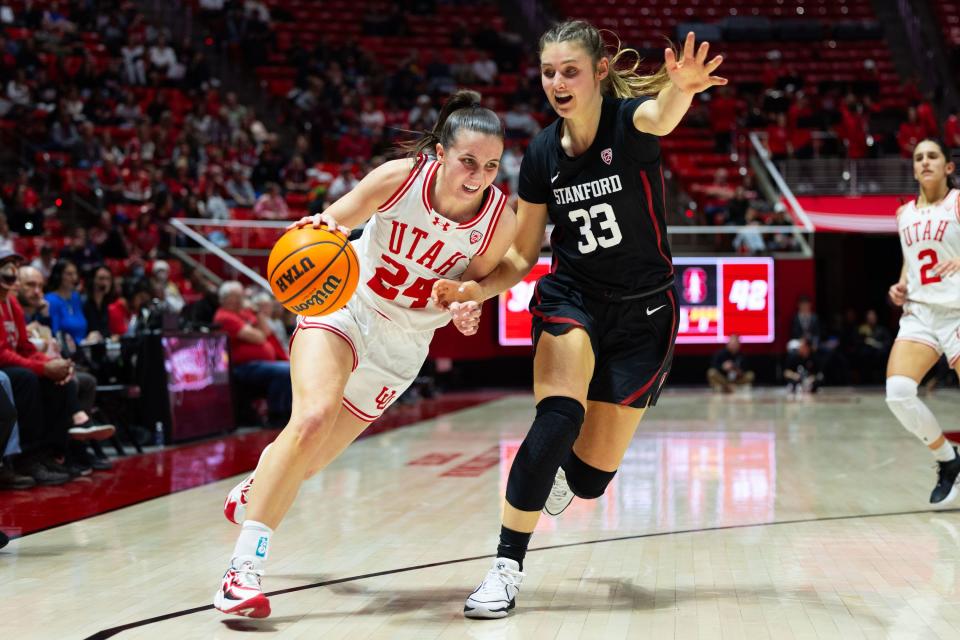 Utah Utes guard Kennady McQueen (24) drives the ball past Stanford Cardinal guard Hannah Jump (33) during a college women’s basketball game between the Utah Utes and the Stanford Cardinal at the Jon M. Huntsman Center in Salt Lake City on Friday, Jan. 12, 2024. | Megan Nielsen, Deseret News