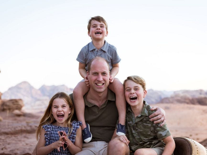 A photo of Prince William with his children