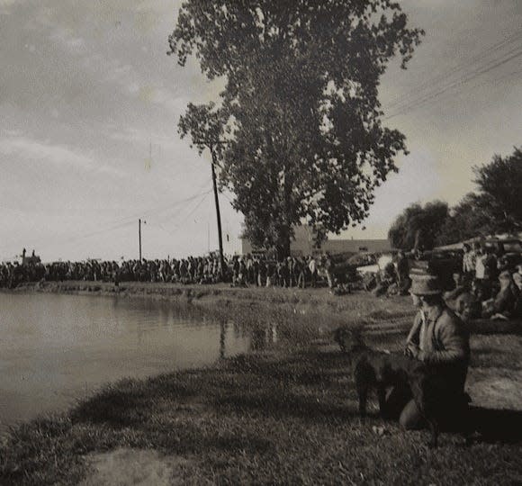A Pointe Mouillee waterfowl hunting event is pictured in the 1940s. In 1875, successful businessmen purchased 2,000 acres at Pointe Mouillee and formed the Big 8 Hunt Club. Today, the Pointe Mouillee Waterfowl Festival honors the area’s hunting and fishing history each year.