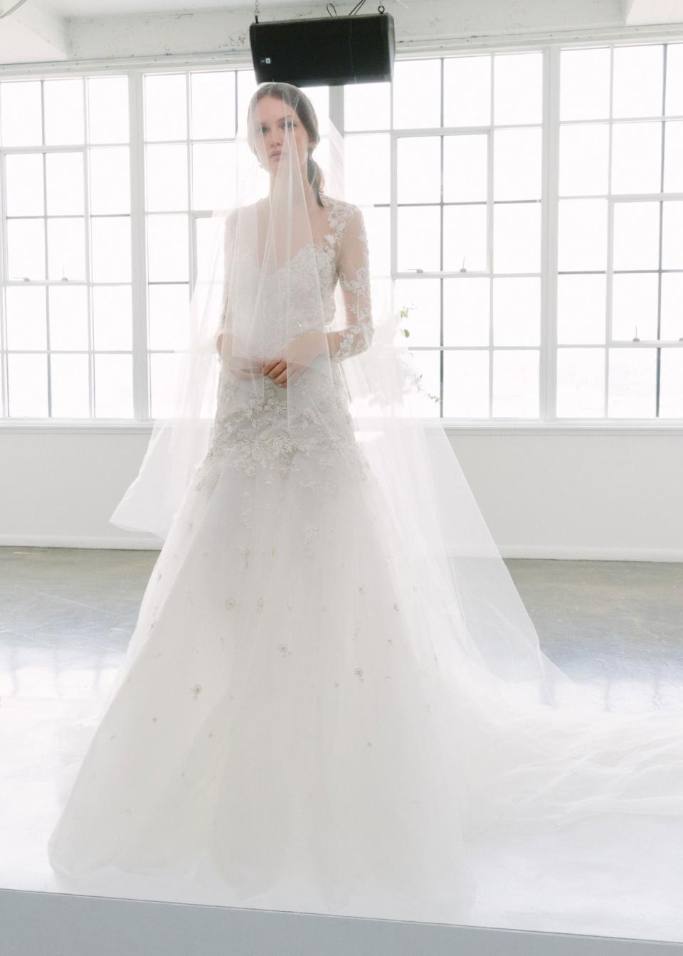 Floral-lace embellished gown with long veil from the Marchesa Spring 2018 bridal collection