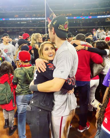 <p>Trea Turner Instagram</p> Trea Turner and Kristen Turner hugging after a baseball game.