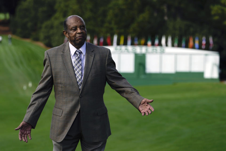 FILE - Lee Elder poses for a picture at the Masters golf tournament Monday, Nov. 9, 2020, in Augusta, Ga. Elder broke down racial barriers as the first Black golfer to play in the Masters and paved the way for Tiger Woods and others to follow. The PGA Tour confirmed Elder’s death, which was first reported by Debert Cook of African American Golfers Digest. No cause or details were immediately available, but the tour said it spoke with Elder's family. He was 87. (AP Photo/Chris Carlson, File)