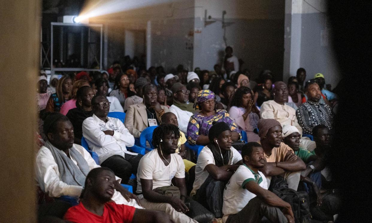 <span>A packed house at the culture centre in Pikine, Dakar, watches Cinemovel’s showing of Io Capitano. It’s the first stop on Cinemovel’s tour of Senegal.</span><span>Photograph: Niccolò Barca/Cinemovel</span>