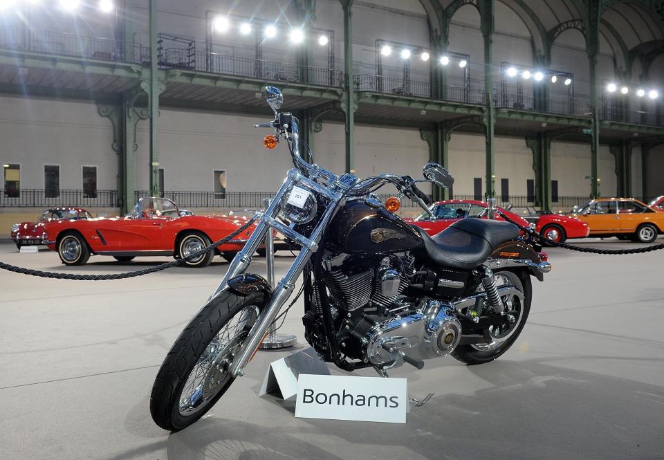 The 2013 Harley Davidson 1 585 cm3 Dyna Super Glide Custom&nbsp;that was donated to Pope Francis is&nbsp;seen on display ahead of Bonham's sale of vintage cars on&nbsp;Feb. 5, 2014. (Photo: Antoine Antoniol via Getty Images)