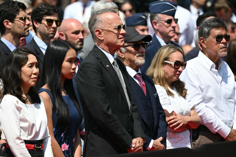Tom Hanks and Steven Spielberg attend the U.S. ceremony marking the 80th anniversary of the World War II "D-Day" Allied landings in Normandy, at the Normandy American Cemetery and Memorial in Colleville-sur-Mer, which overlooks Omaha Beach in northwestern France, on June 6, 2024.