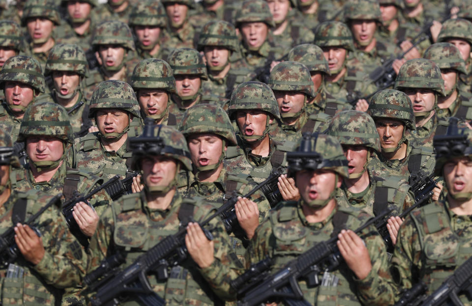 In this photo taken on Saturday, Oct. 19, 2019, Serbian Army soldiers perform during rehearsal exercise in Batajnica, military airport near Belgrade, Serbia. Serbia on Thursday. Dec. 15, 2022 formally demanded that its security forces return to the breakaway former province of Kosovo, despite warnings from the West that such calls are unlikely to be accepted and only add to tensions in that part of the Balkans. (AP Photo/Darko Vojinovic)