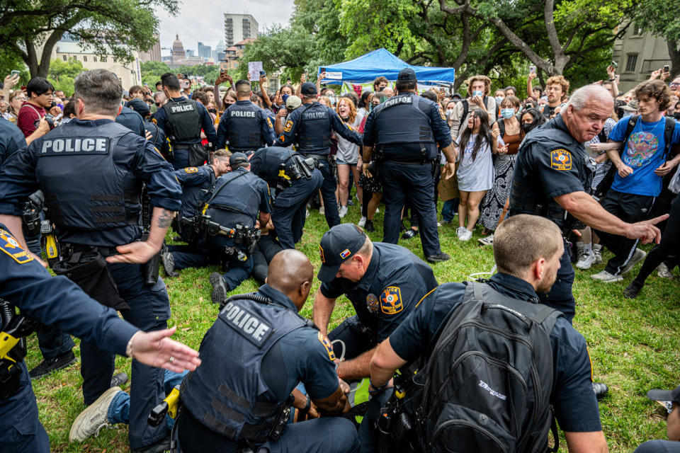 Police arrest protesters at a pro-Palestine demonstration. (Brandon Bell / Getty Images)