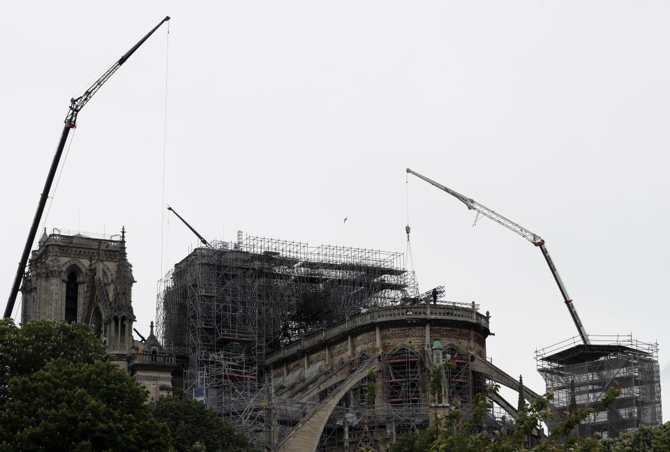 Notre-Dame's now mostly-destroyed roof was made of wood, and included some of the original beams erected in the 12th century. Source: AP