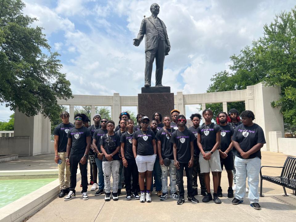 Mighty Light Team of the Omega Lamplighters on visit to  George Dealey memorial in Dallas on trip to the 2023 StompWars World Championship in Garland, Texas.