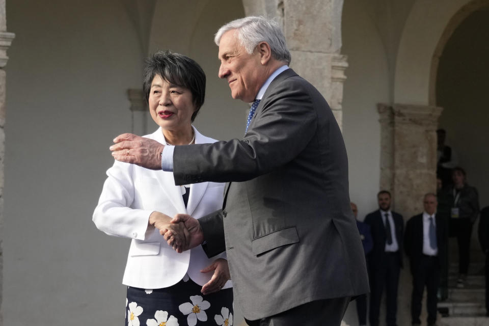 Italian Foreign Minister Antonio Tajani, right, welcomes Japanese Foreign Minister Yoko Kamikawa at the G7 Foreign Ministers meeting, on the Island of Capri, Italy, Wednesday, April 17, 2024. Group of Seven foreign ministers are meeting on the Italian resort island of Capri, with soaring tensions in the Mideast and Russia's continuing war in Ukraine topping the agenda. The meeting runs April 17-19. (AP Photo/Gregorio Borgia)