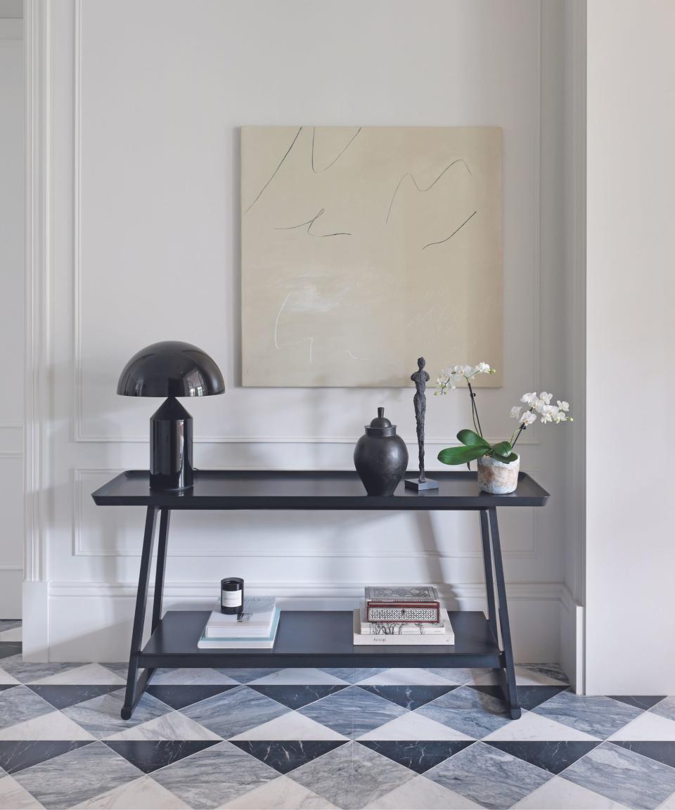 Marble floor in entryway with console table