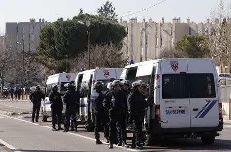 French CRS riot police officers secure the access to the Castellane housing area in Marseille, February 9, 2015. REUTERS/Jean-Paul Pelissier