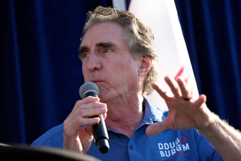 Republican presidential candidate North Dakota Gov. Doug Burgum speaks during a Fair-Side Chat with Iowa Gov. Kim Reynolds at the Iowa State Fair, Friday, Aug. 11, 2023, in Des Moines, Iowa (AP)