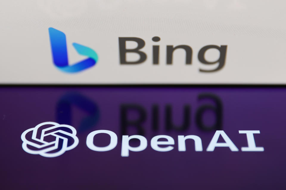 Bing logo displayed on a laptop screen and OpenAI logo displayed on a phone screen are seen in this illustration photo taken in Krakow, Poland on February 7, 2023. (Photo by Jakub Porzycki/NurPhoto via Getty Images)