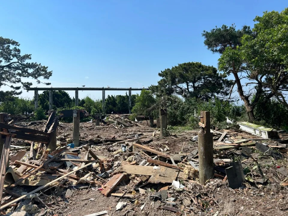 Debris remains on the island and is slowly being removed completely off the island. Shaun McCafferty/R. Kremer & Son Marine Contractors