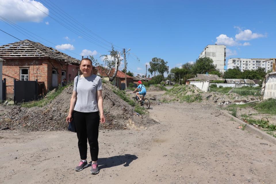 <div class="inline-image__caption"><p>55-year-old Tanya in the streets of Okhytyrka.</p></div> <div class="inline-image__credit">Stefan Weichert</div>