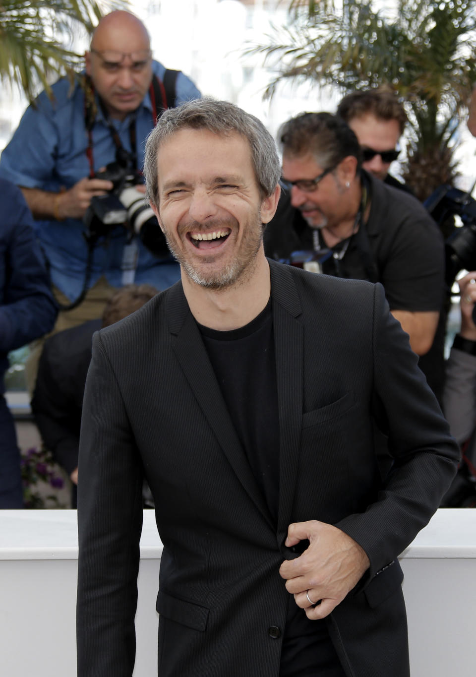 Director Jerome Salle poses for photographers during a photo call for the film Zulu at the 66th international film festival, in Cannes, southern France, Sunday, May 26, 2013. (AP Photo/Lionel Cironneau)