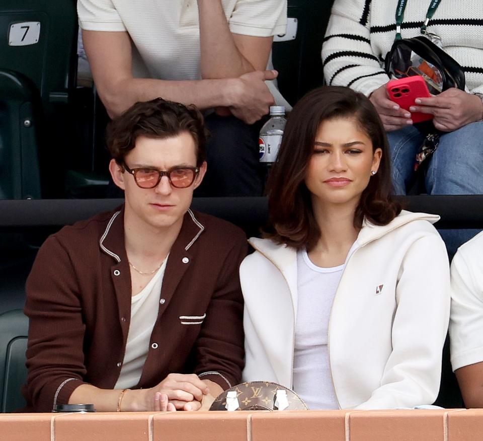 tom holland, zendaya at the bnp paribas open tennis game