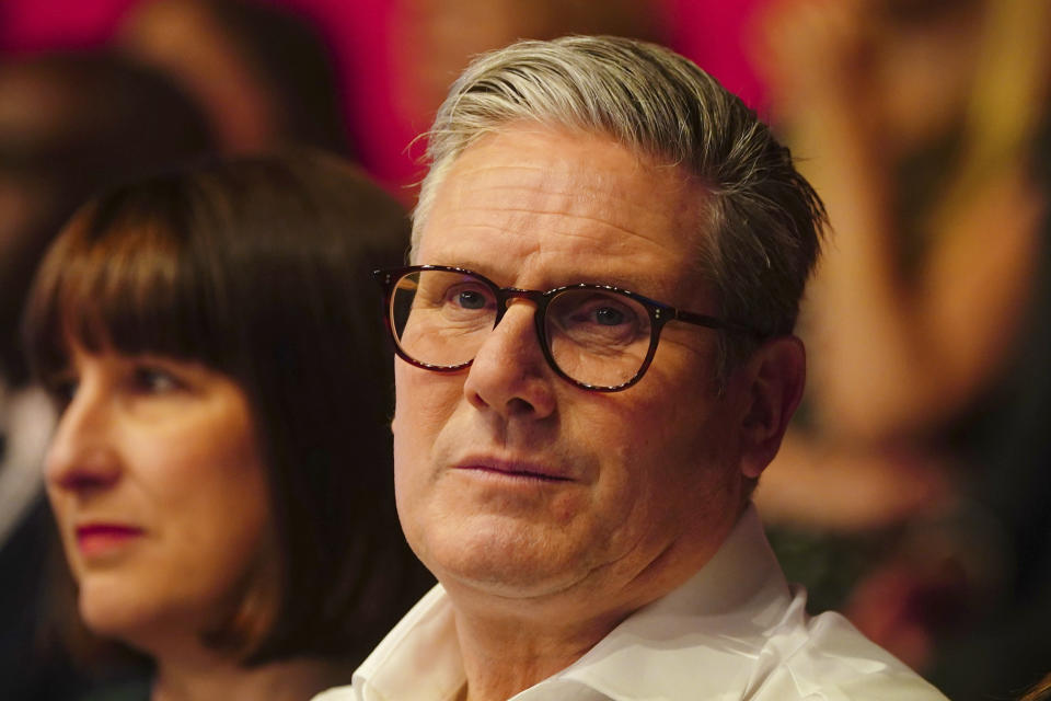 Labour Party leader Sir Keir Starmer looks on during his visit to the Backstage Centre for the launch of Labour's doorstep offer to voters ahead of the general election, in Purfleet, Essex, England, Thursday May 16, 2024. (Victoria Jones/PA via AP)