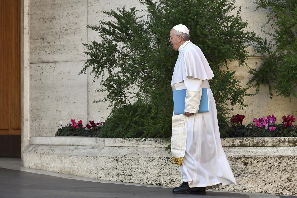 Pope Francis arrives for the opening of a sex abuse prevention summit, at the Vatican, Thursday, Feb. 21, 2019. The gathering of church leaders from around the globe is taking place amid intense scrutiny of the Catholic Church's record after new allegations of abuse and cover-up last year sparked a credibility crisis for the hierarchy. (Vincenzo Pinto/Pool Photo via AP)