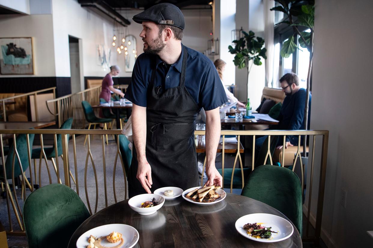 Jason Sweeney, chef de cuisine at Asheville Proper in the Grove Arcade, March 25, 2022.