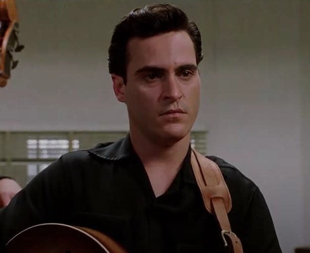 Joaquin Phoenix as Johnny Cash prepares to sing a song for an audition