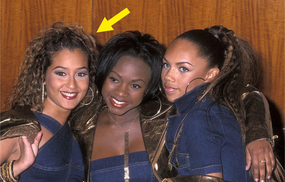 Adrienne Eliza Houghton with two other young women; all three wear denim outfits