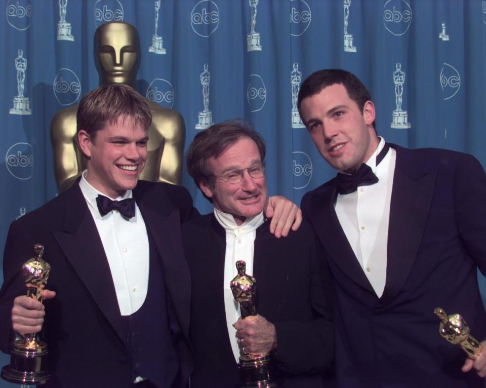 From left, Matt Damon, Robin Williams and Ben Affleck took home Oscars for "Good Will Hunting" at the 70th Academy Awards.